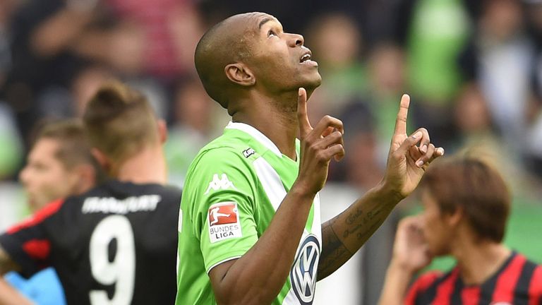 Wolfsburg's Brazilian defender Naldo reacts after scoring during the German first division Bundesliga football match VfL Wolfsburg vs Eintracht Frankfurt