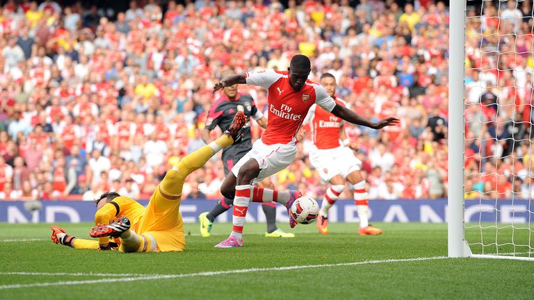 Arsenal's Yaya Sanogo scores his side's first goal of the game during the Emirates Cup match against Benfica at the Emirates Stadium, London.