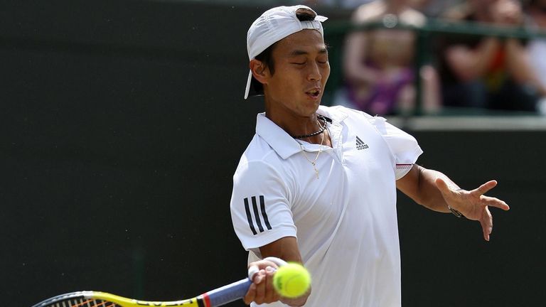 Yen-Hsun Lu in action against Serbia's Novak Djokovic during Day Nine of the 2010 Wimbledon Championships at the All England Lawn Tennis Club, Wimbledon.