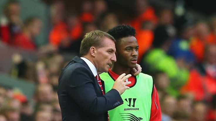 LIVERPOOL, ENGLAND - SEPTEMBER 13: Brendan Rodgers, manager of Liverpool talks to Raheem Sterling of Liverpool during the Barclays Premier League match bet