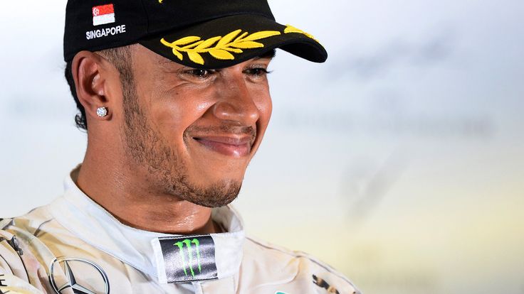 Race winner Lewis Hamilton on the podium