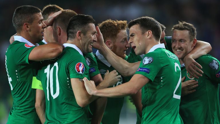 Ireland's Aiden McGeady (right) celebrates scoring opening goal with Robbie Keane and Seamus Coleman during the UEFA Euro 2016 Qualifying, Group D match at