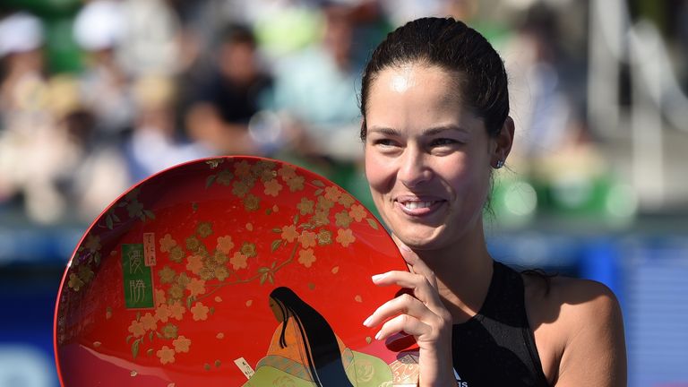 Ana Ivanovic of Serbia holds the trophy during the awarding ceremony after the final match against Caroline Wozniacki of Denmark at the Pan Pacific Open te