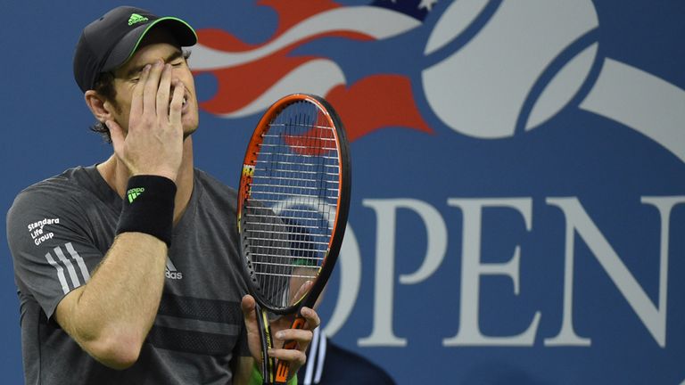 Andy Murray of Great Britain reacts to a point against Novak Djokovic of Serbia during their US Open 2014 men's quarterfinals match.