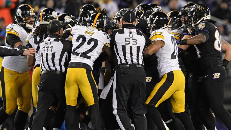 Pittsburgh Steelers and Baltimore Ravens players scuffle in the first half at M&T Bank Stadium