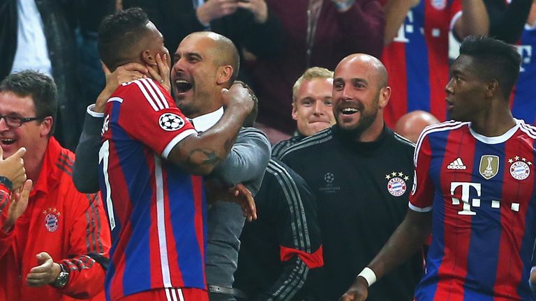 Jerome Boateng of Bayern Munich celebrates his goal with coach Josep Guardiola