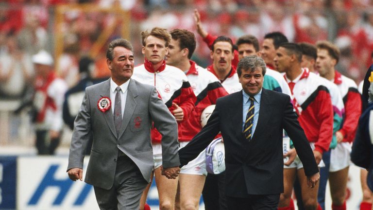 Tottenham Hotspur manager Terry Venables and Nottingham Forest manager Brian Clough lead the teams out hand in hand before the 1991 FA Cup Final