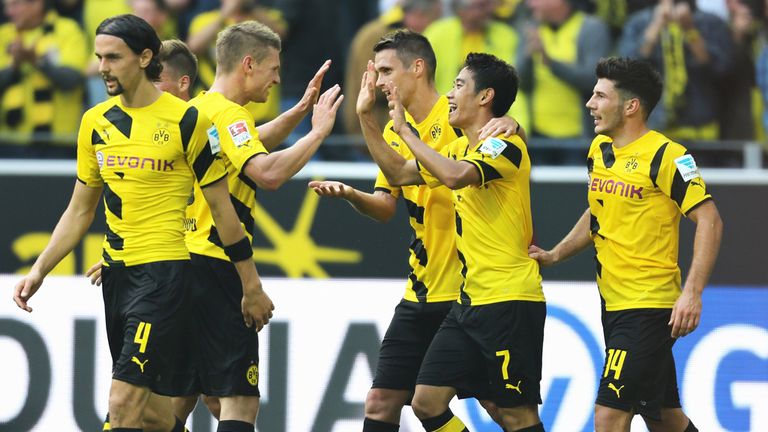 Shinji Kagawa celebrates after scoring for Borussia Dortmund