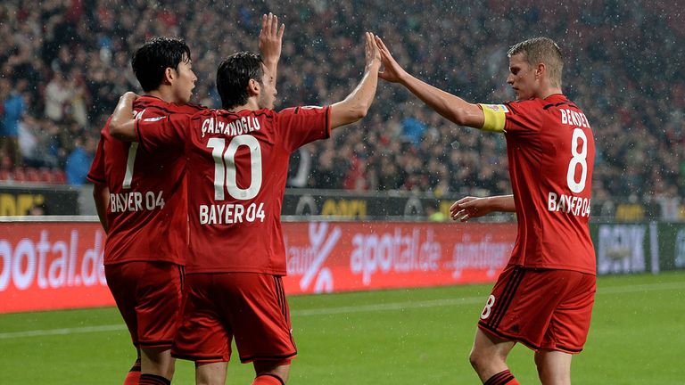 LEVERKUSEN, GERMANY - SEPTEMBER 24:  Heung Min Son (L) of Leverkusen celebrates with team mates 