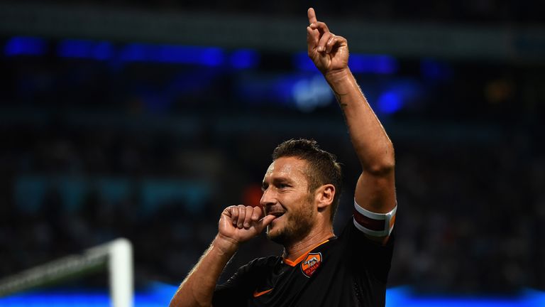 Francesco Totti of AS Roma celebrates scoring his team's first goal during the UEFA Champions League Group E match