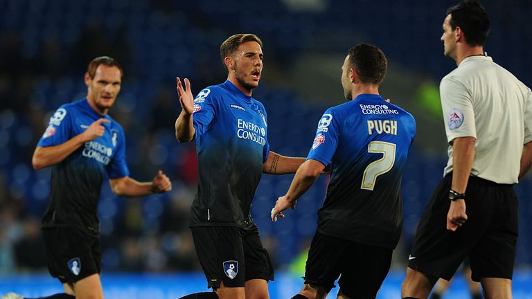 Dan Gosling of Bournemouth (c) celebrates after scoring the opening goal during the Capital One Cup third round match