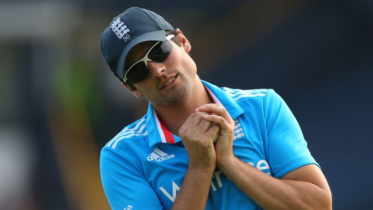 England captain Alastair Cook smiles after taking a catch
