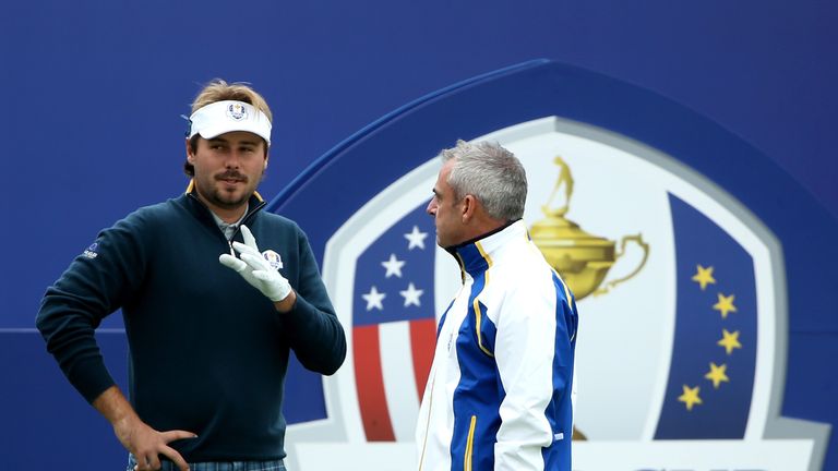 Victor Dubuisson of Europe talks to Europe team captain Paul McGinley during practice ahead of the 2014 Ryder Cup