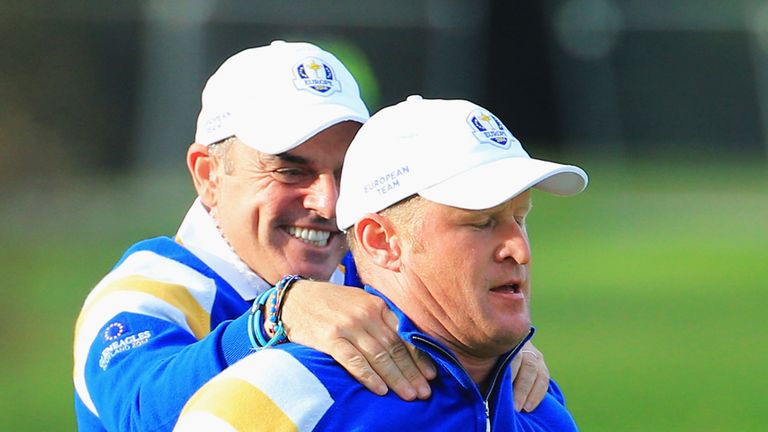 Paul McGinley congratulates Donaldson as the celebrations begin