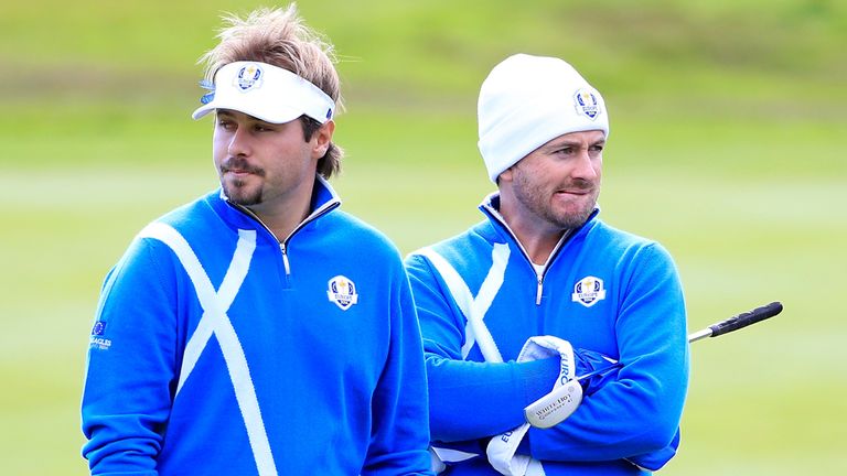 Victor Dubuisson with Graeme McDowell on the 10th green 