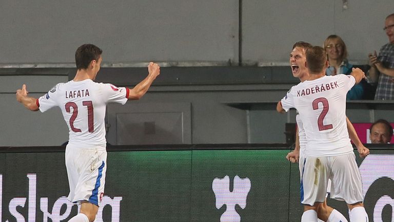 Borek Dockal (C) celebrates with Czech striker David Lafata (L) and defender Pavel Kaderabek after scoring in Czech Republic vs Netherlands