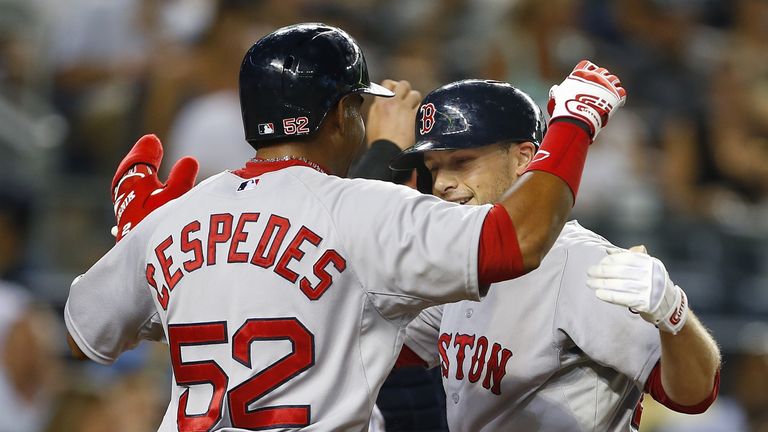 Daniel Nava #29 of the Boston Red Sox is congratulated by Yoenis Cespedes #52 after hitting a three run home run against the New York Yankees