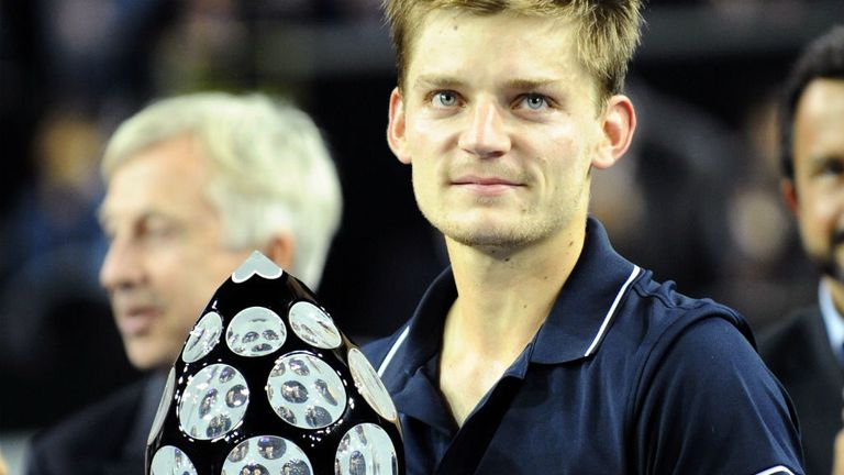 David Goffin holds the trophy after defeating Joao Sousa at the ATP Moselle Open final