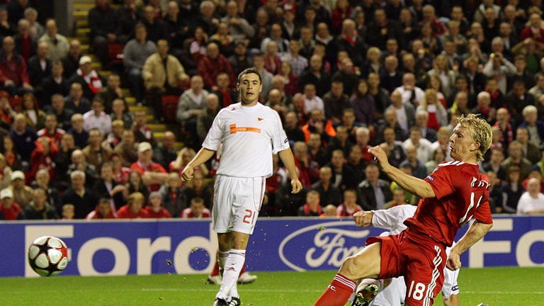 Liverpool's Dirk Kuyt scores