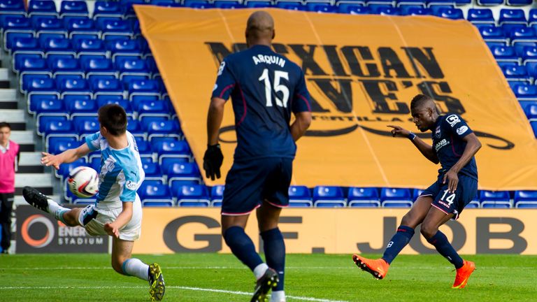 Ross County's Darren Maatsen (right) scores the winning goal.