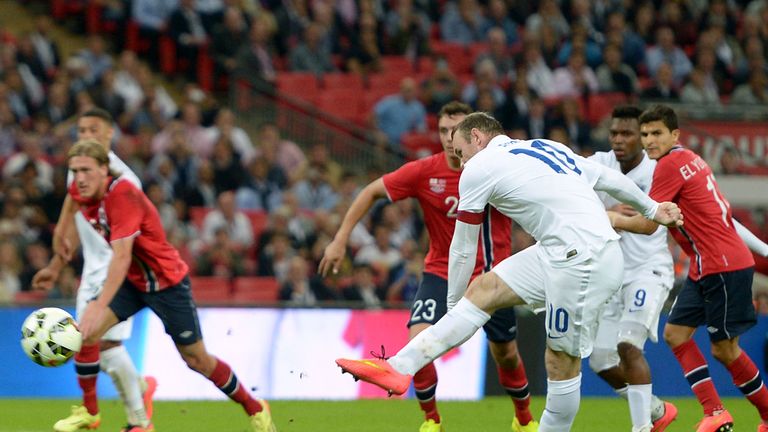 England's Wayne Rooney scores their first goal of the game from the penalty spot during the International Friendly at Wembley Stadium, London