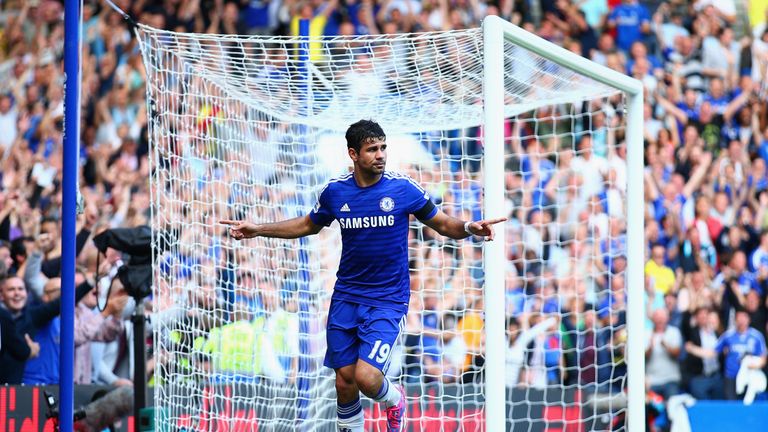 Diego Costa of Chelsea celebrates as scores his and his team's third goal against Swansea