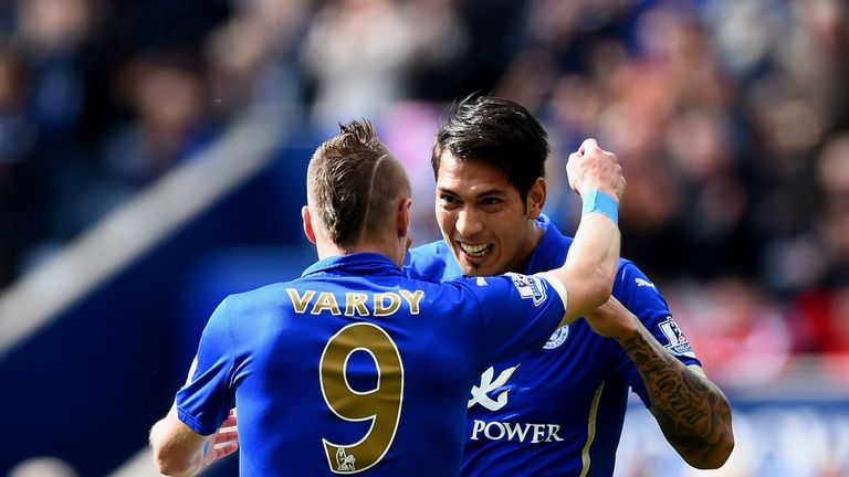 Leonardo Ulloa of Leicester City is congratulated by teammate Jamie Vardy of Leicester City after scoring his team's first v Man Utd