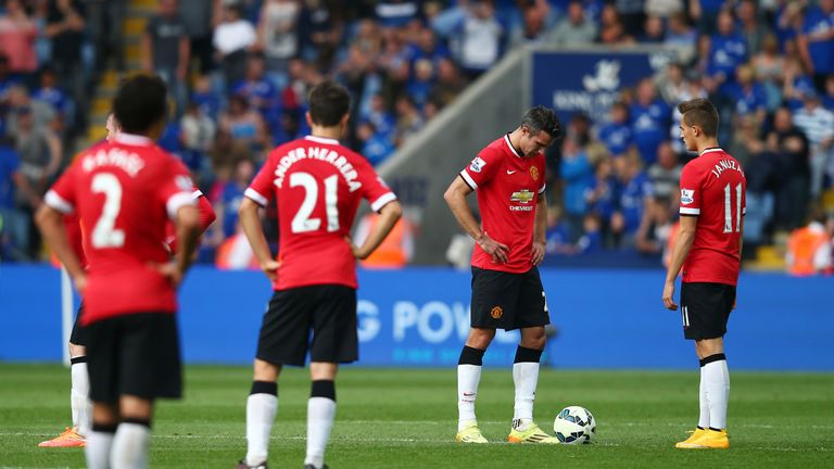 LEICESTER, ENGLAND - SEPTEMBER 21:  Dejected Manchester United players look on as they head towards a 5-3 defeat during the Barclays Premier League match b