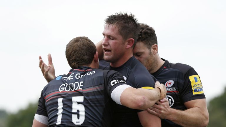 Ernst Joubert of Saracens celebrates scoring a try with Alex Goode during the Aviva Premiership match against Sale Sharks
