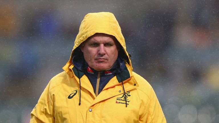 Australia coach Ewen McKenzie watches his team warm up