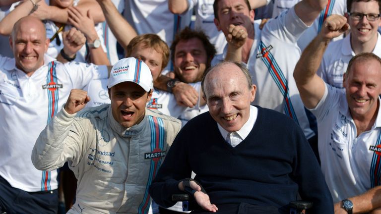 Felipe Massa celebrates his Italian GP podium with Frank Williams and the rest of the Grove team