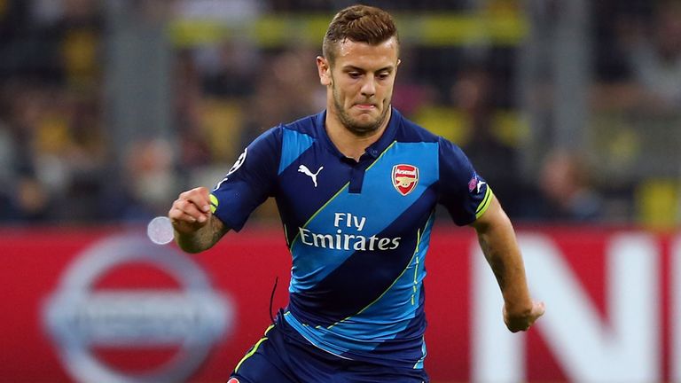 DORTMUND, GERMANY - SEPTEMBER 16:  Jack Wilshere of Arsenal London runs with the ball the UEFA Champions League Group D match between Borussia 