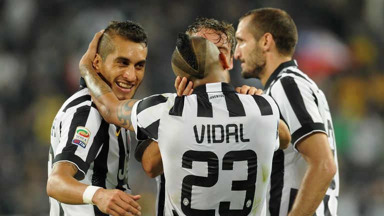Arturo Vidal of Juventus FC celebrates with team-mates
