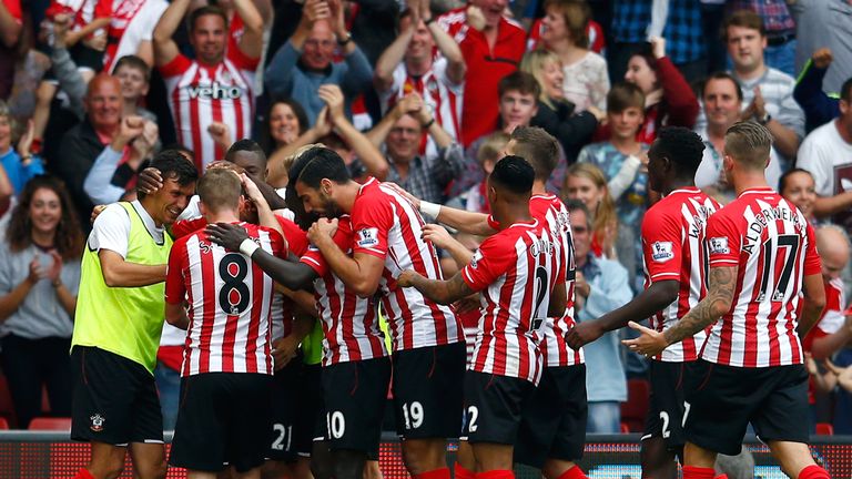 Ryan Bertrand of Southampton celebrates with his team-mates after scoring the opening goal