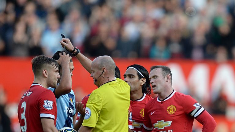 Manchester United's Wayne Rooney stands in disbelief after being shown a red card by referee Lee Mason against West Ham United in the Premier League