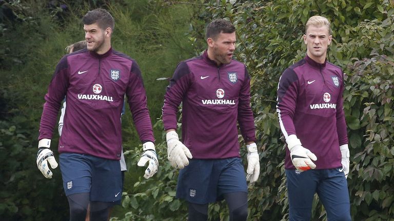 England's goalkeepers Fraser Forster, Joe Hart and Ben Foster arrive for a training session at London Colney on September 1, 2014