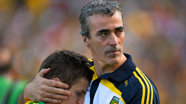 Donegal manager Jim McGuinness consoles Darach O'Connor after Sunday's defeat