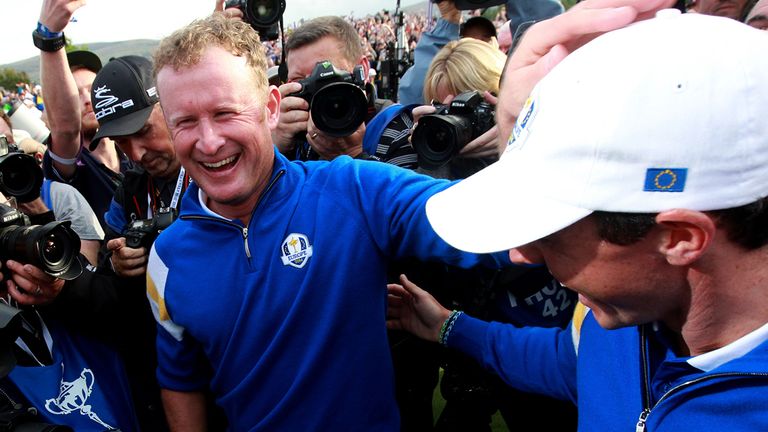 Donaldson is congratulated by Rory McIlroy, who had earlier thrashed Fowler