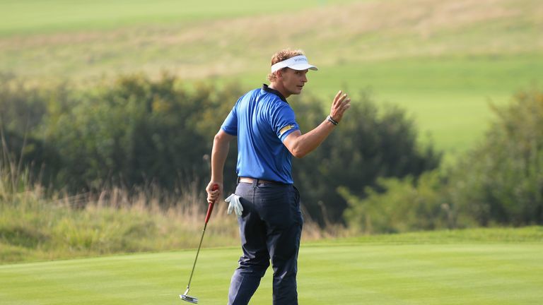 NEWPORT, WALES - SEPTEMBER 20:  Joost Luiten of The Netherlands celebrates going 13 under on the 17th green during day three of the ISPS Handa Wales Open a