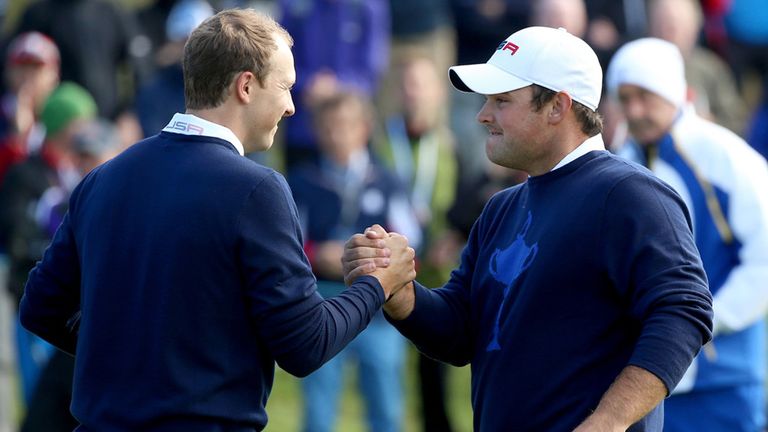 AUCHTERARDER, SCOTLAND - SEPTEMBER 26: Jordan Spieth (L) and Patrick Reed of the USA celebrate victory on the 14th green during the Morning Fourballs
