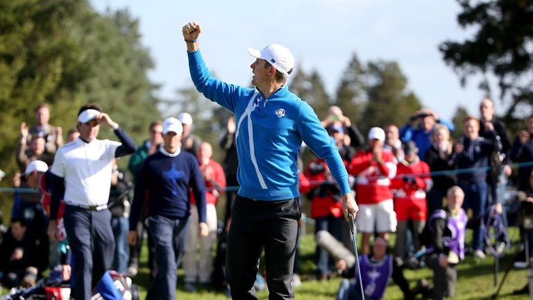 Justin Rose celebrates winning the first point of the 2014 Ryder Cup. Rose and Henrik Stenson beat Bubba Watson and Webb Simpson 5&4