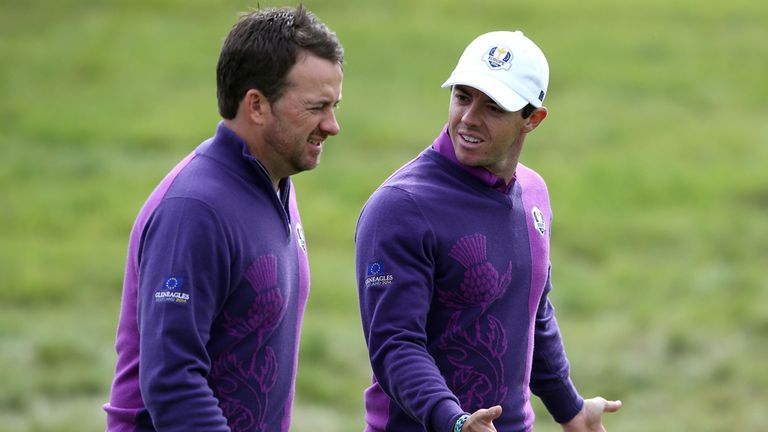 Europe's Graeme McDowell with teammate Rory McIlroy during a practice session at Gleneagles Golf Course, Perthshire.