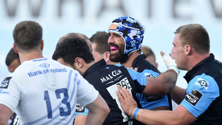 Glasgow Warriors captain Josh Strauss (centre) is hailed after adding a third try
