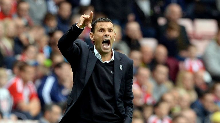 SUNDERLAND, ENGLAND - SEPTEMBER 27:  Gustavo Poyet the manager of Sunderland reacts during the Barclays Premier League match between Sunderland and Swansea
