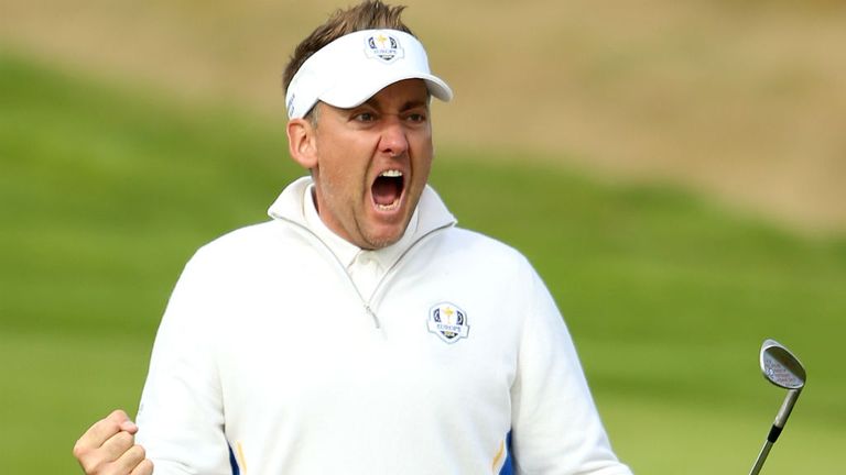 Ian Poulter celebrates chipping in on the 15th hole during the Morning Fourballs of the 2014 Ryder Cup