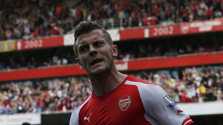 Arsenal midfielder Jack Wilshere celebrates scoring against Manchester City 