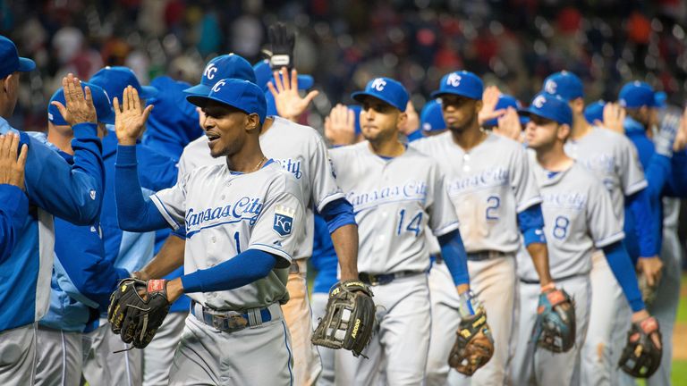 Jarrod Dyson #1 of the Kansas City Royals celebrates with his team-mates after they defeated the Cleveland Indians 