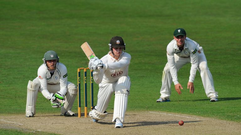 Surrey batsman Jason Roy picks up some runs watched by Worcestershire wicketkeeper Ben Cox during day two of the LV= County Championship clash at New Road