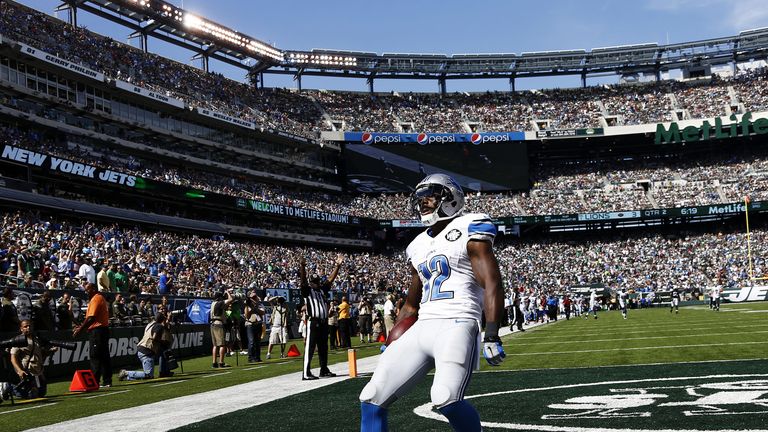 Jeremy Ross of the Detroit Lions celebrates scoring a touchdown