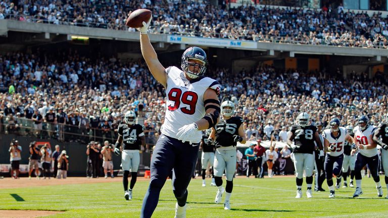 JJ Watt #99 of the Houston Texans celebrates after scoring a touchdown against the Oakland Raiders